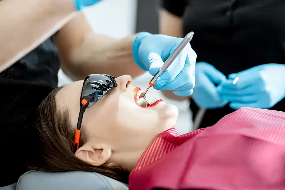 woman-during-the-dental-examination What Are Dental Sealants: Who Should Get Them?